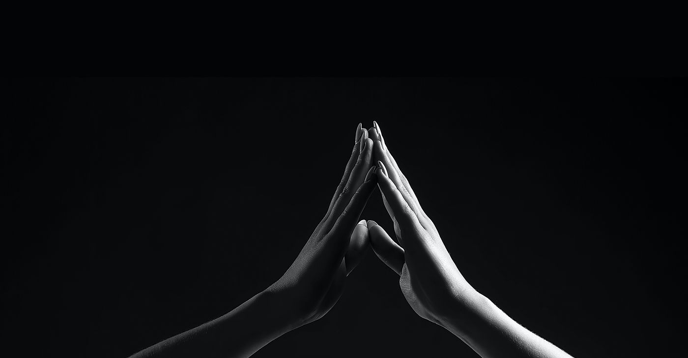 Hands in thoughtful pose