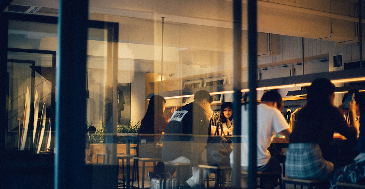 Dimly lit restaurant interior with warm ambient lighting
